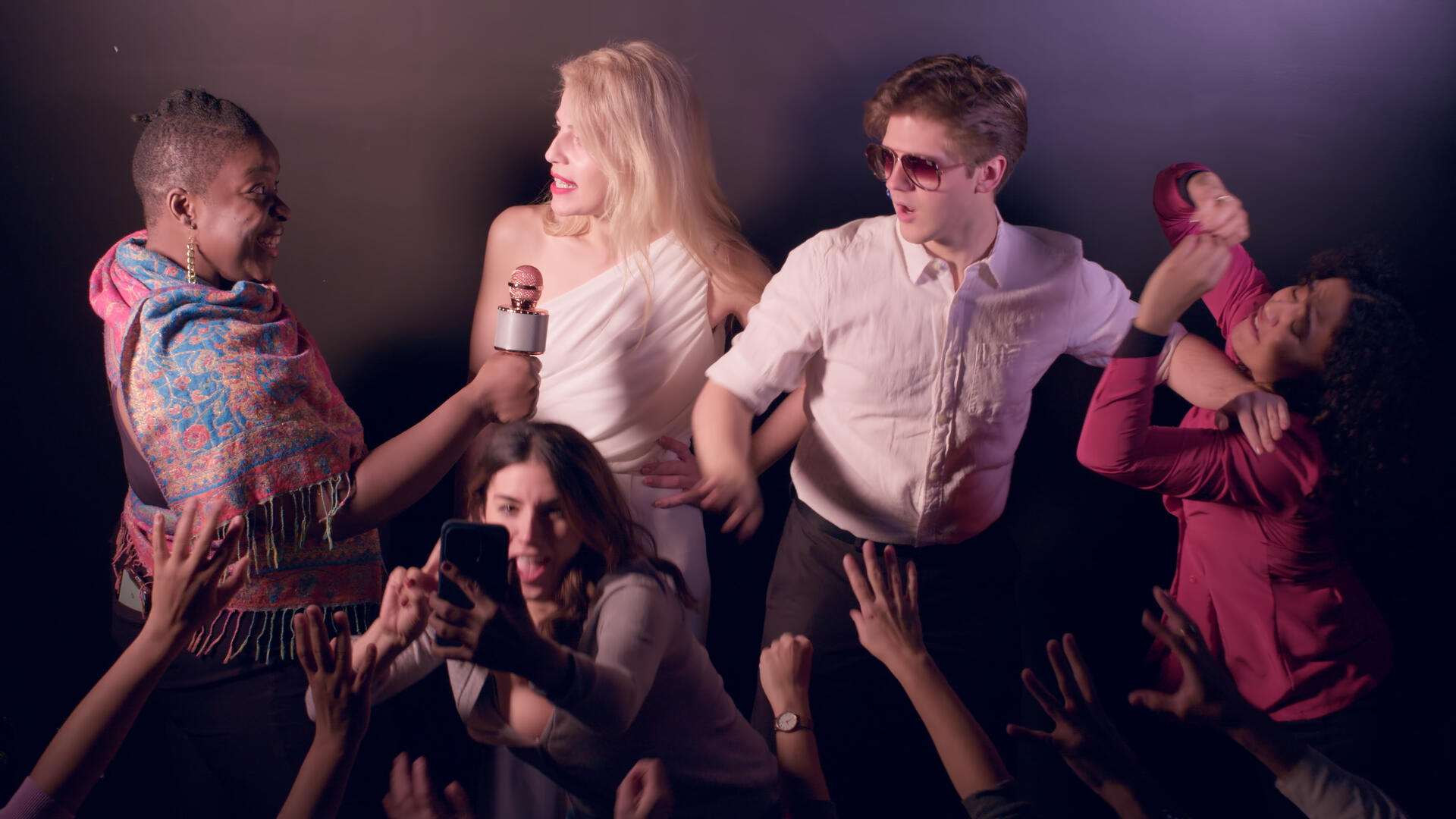 Late Bloomers Still 4 All leads of Late Bloomers stand in a spotlight, dressed to the nines, while fighting off a wave of paparazzi.